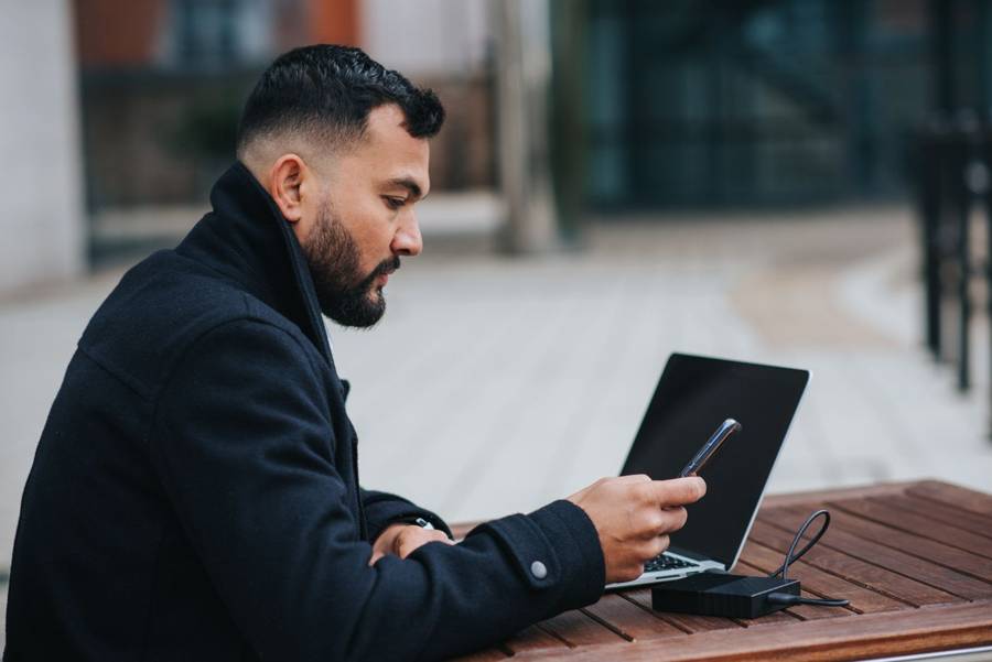 Entrepreneur with phone and laptop